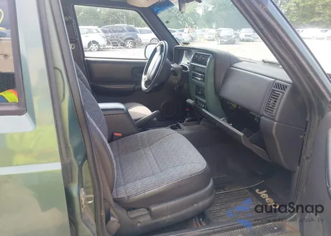 2000 Jeep Cherokee Sport from USA, damaged, VIN 1J4FF48S8YL242593